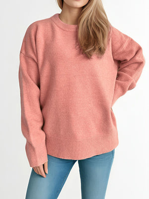 Oversized crewneck knit pullover sweater in Burnt Coral with ribbed cuffs and hem.