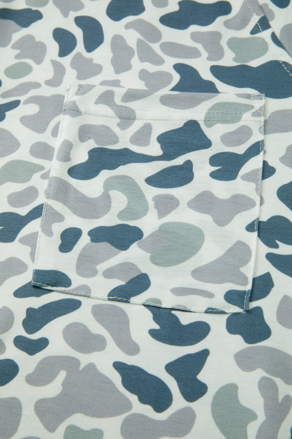 Camo print t-shirt with V-neck and chest pocket.