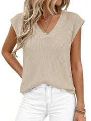 Textured apricot V-neck sweater vest with cap sleeves.