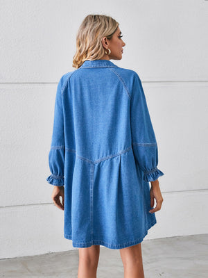 Denim shirtdress in dark blue with ruffled cuff sleeves and a gathered hem.
