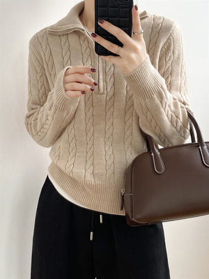 Beige cable knit quarter-zip pullover sweater with a relaxed fit.