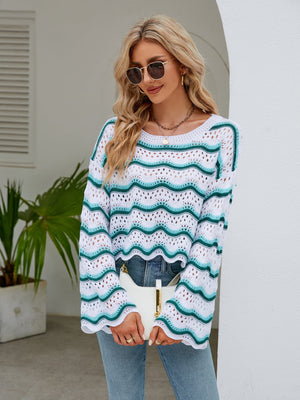 Scalloped crochet sweater with white and turquoise wavy stripes, long sleeves, and a relaxed fit.