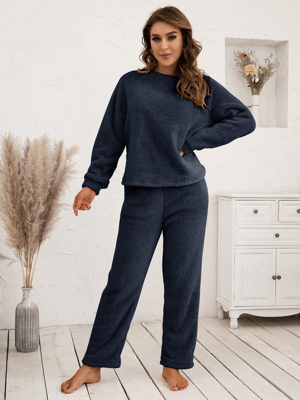 Plush raglan sleeve lounge set in dark blue, featuring a crew neck sweatshirt and relaxed fit pants.