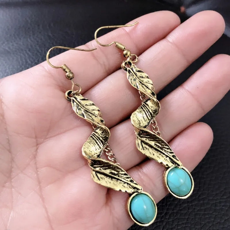 Gold feather cascade drop earrings with turquoise stones