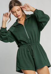 Dark green drawstring waist romper with funnel neck and zip front