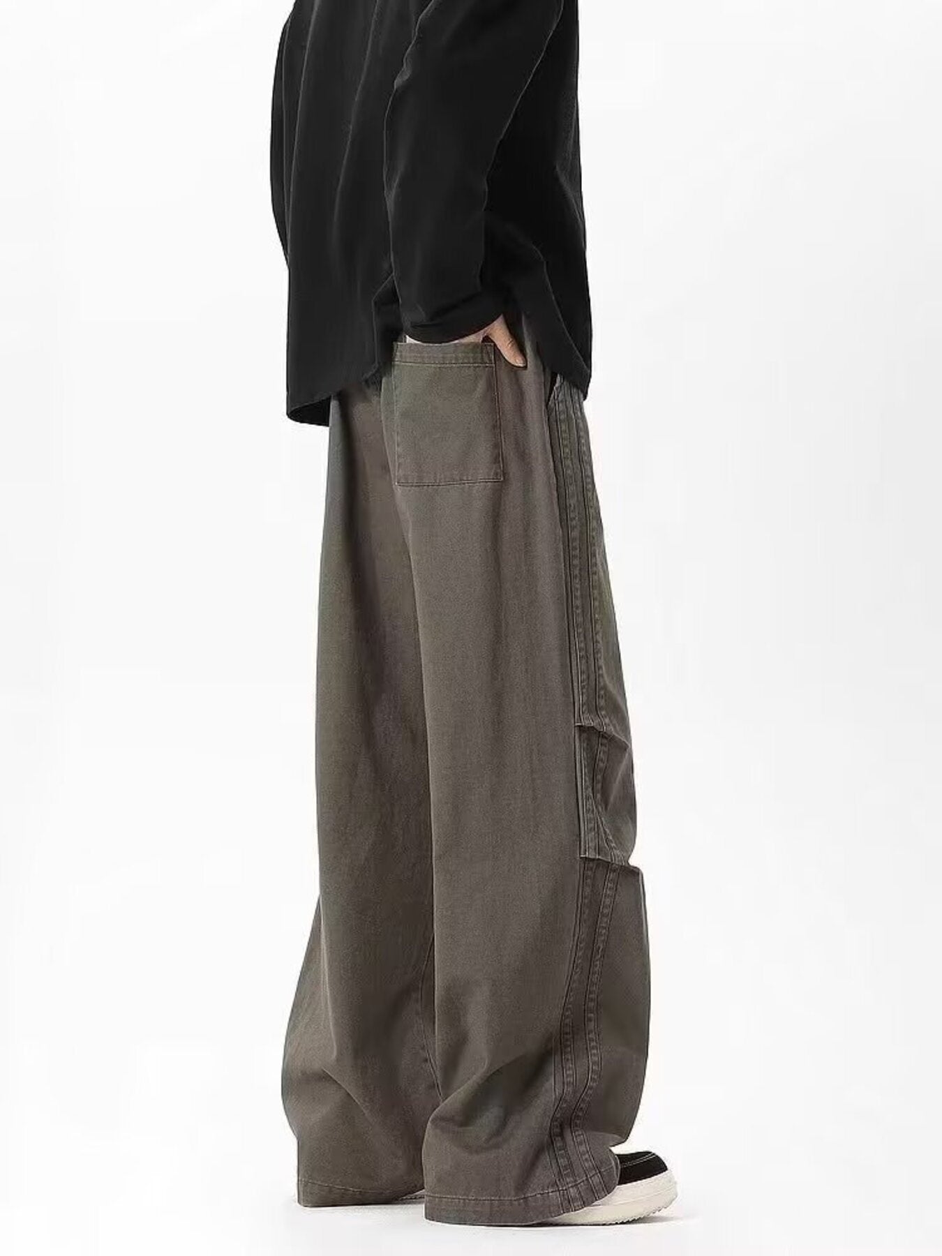 Men's plus size green drawstring cargo pants with side pockets and a relaxed fit.