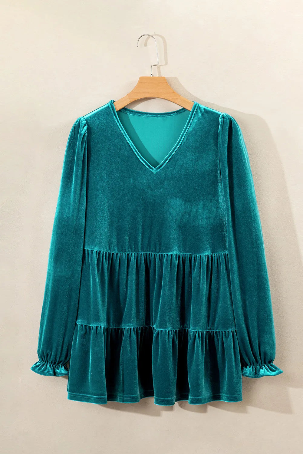 Turquoise velvet tiered blouse with puffed sleeves and V-neck