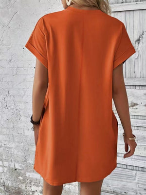 Orange-Red relaxed tee dress with cuffed sleeves and pockets