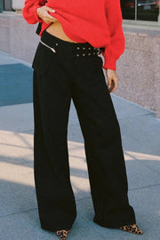 Black flared denim trousers with utility buckle detail and zip fly
