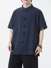 Navy blue cotton short-sleeve shirt with mandarin collar and frog button closure.