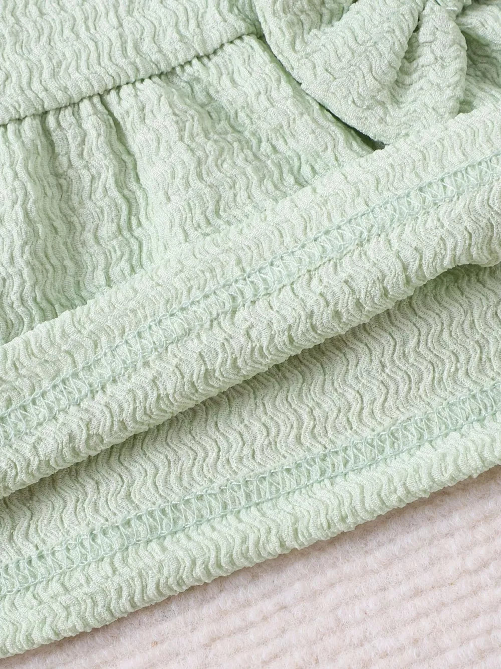 Children's Bow Tank And Shorts Set in Light Green, fabric detail