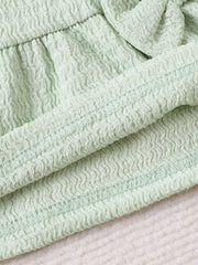 Children's Bow Tank And Shorts Set in Light Green, fabric detail
