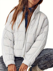 Light grey quilted bomber jacket with stand collar and zipper closure
