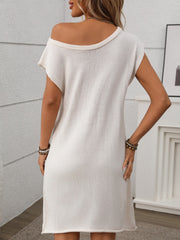 Off-the-shoulder knit shift dress in ivory with short sleeves and a relaxed fit.