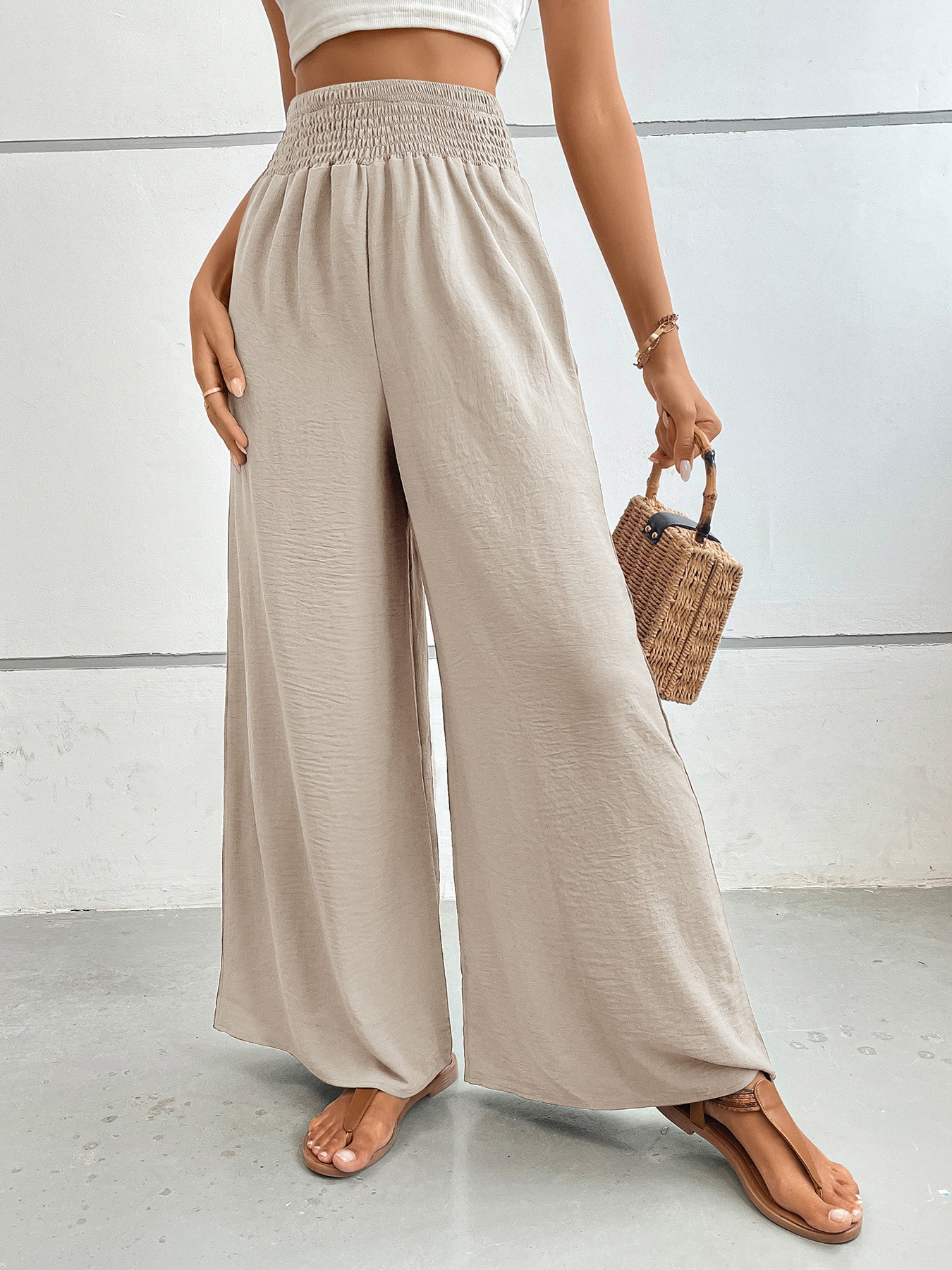 Textured palazzo lounge trousers in Dust Storm with a smocked waistband and wide legs.