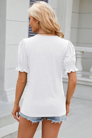White tee with puffed sleeves and ruffled cuffs, crew neck, casual fit