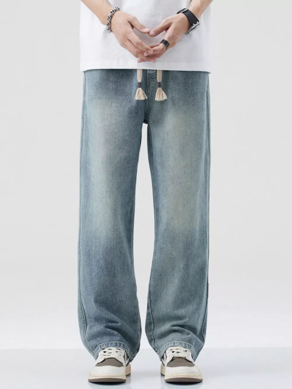 Men's wide-leg jeans in Nostalgic blue denim with a drawstring waist.