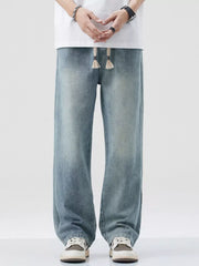 Men's wide-leg jeans in Nostalgic blue denim with a drawstring waist.