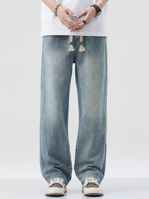 Men's wide-leg jeans in Nostalgic blue denim with a drawstring waist.