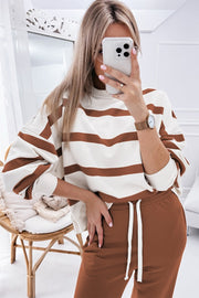 Brown and white striped loungewear set with drawstring pants and crewneck sweatshirt.