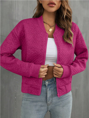 Diamond quilted bomber jacket in Deep Rose with a zip front and ribbed cuffs.