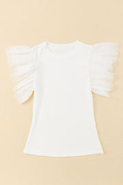 White ribbed knit blouse with sheer polka dot ruffle sleeves