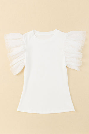 White ribbed knit blouse with sheer polka dot ruffle sleeves
