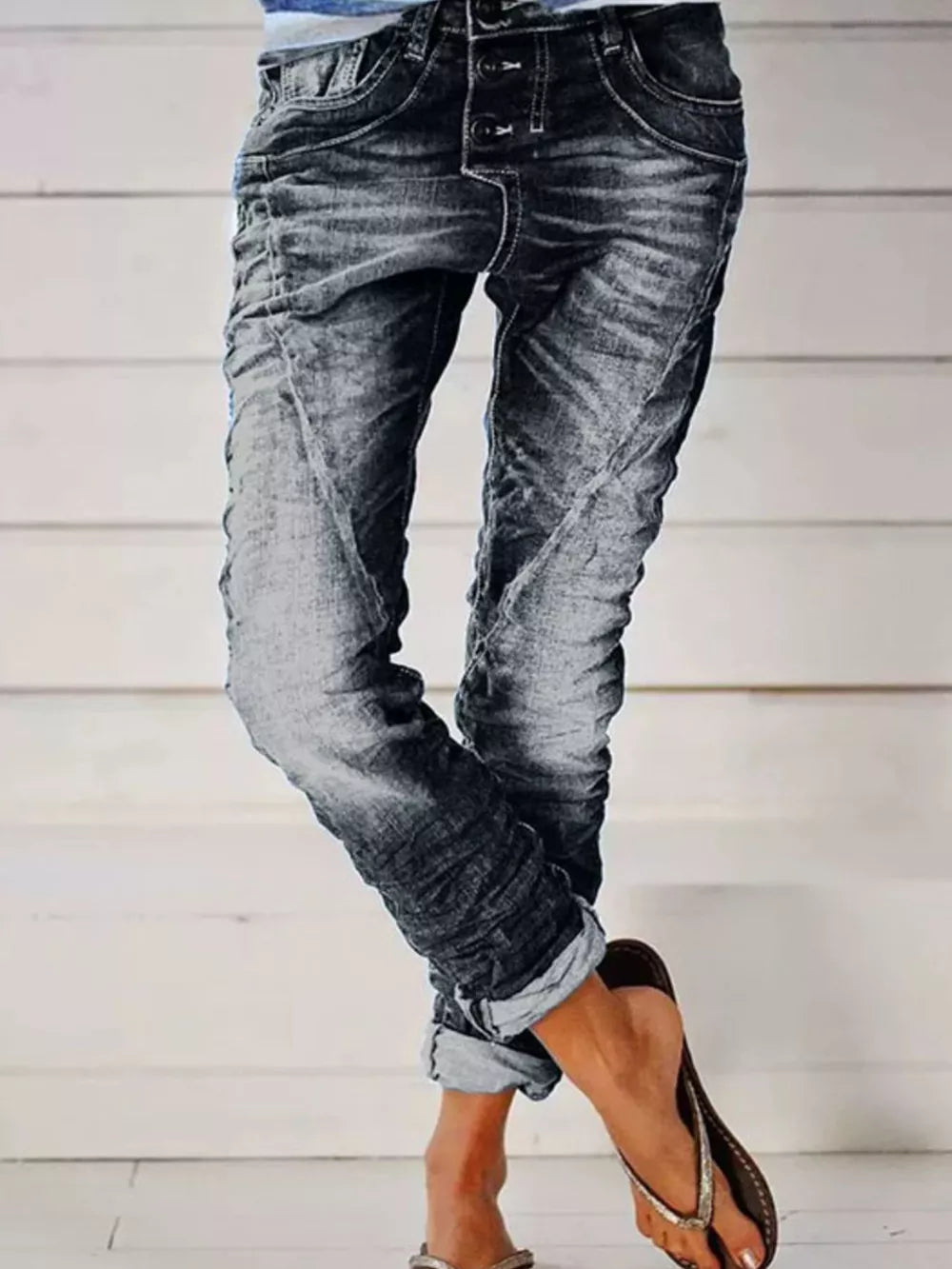 Grey cuffed button-fly jeans with a relaxed fit and distressed wash