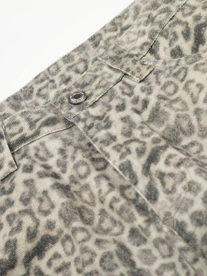 Men's grey leopard print wide-leg cargo sweatpants with distressed details and flap pockets.