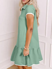Gum Leaf cap sleeve ruffle dress with white trim and zip front detail.