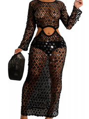 Black mesh cutout maxi gown with sequin details and long sleeves.