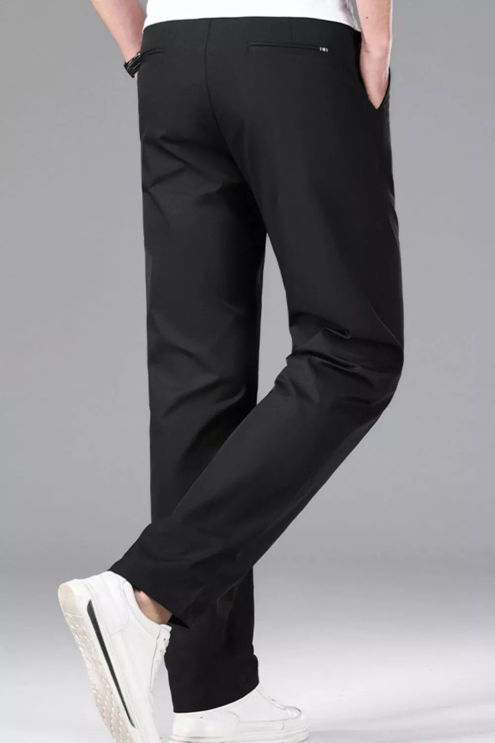 Men's black slim-fit stretch dress pants with a clean, modern cut.
