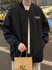 Black bomber jacket with zip front, embroidered logo on chest, and zippered sleeve pocket.