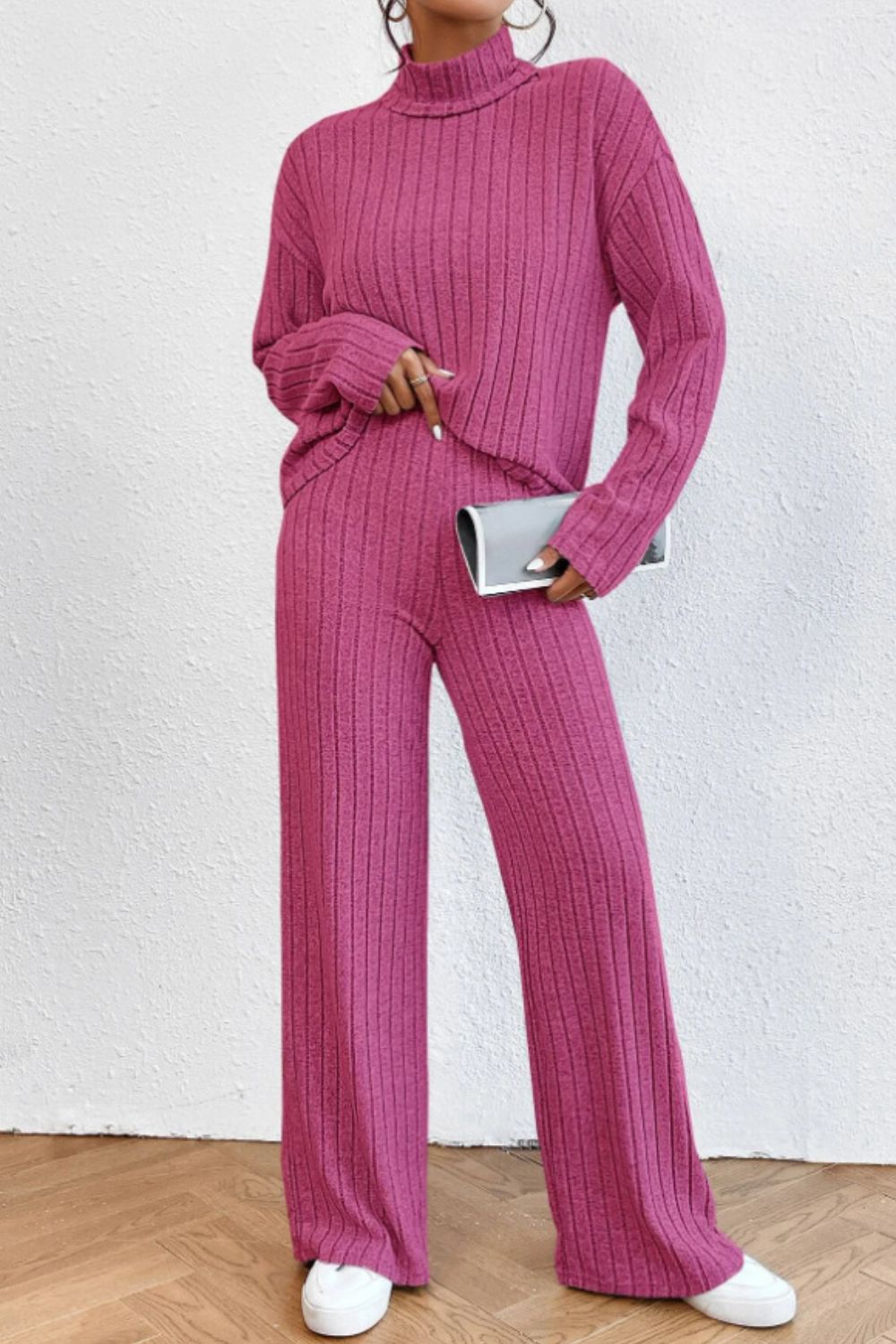 Hot Pink ribbed knit turtleneck lounge set with wide leg pants and long sleeves.