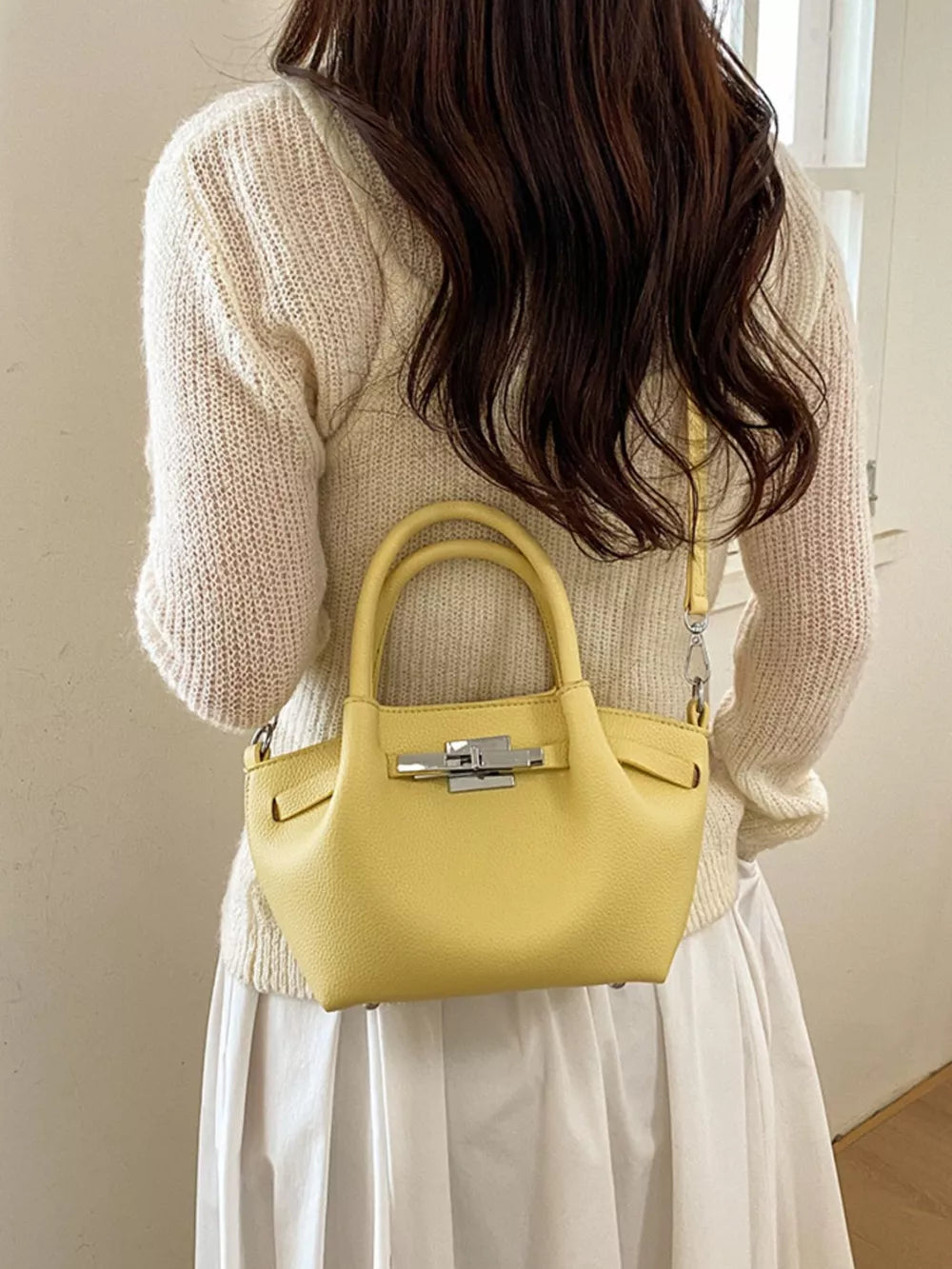 Top Handle Mini Crossbody Bag in Yellow, editorial view