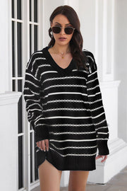 Black and white striped knit mini dress with v-neck and long sleeves