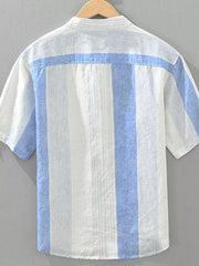 Color block casual short sleeve shirt with blue and white vertical stripes and a horizontal blue stripe across the back yoke.