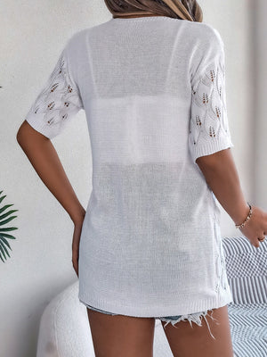 White open-knit leaf motif cardigan with short sleeves and a relaxed fit.