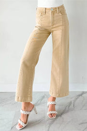 High-waisted cropped wide-leg jeans in tan denim with front seam detail.