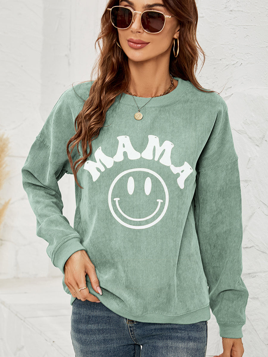 Corduroy sweatshirt in Gum Leaf with white "Mama" smiley graphic, crewneck, long sleeves.
