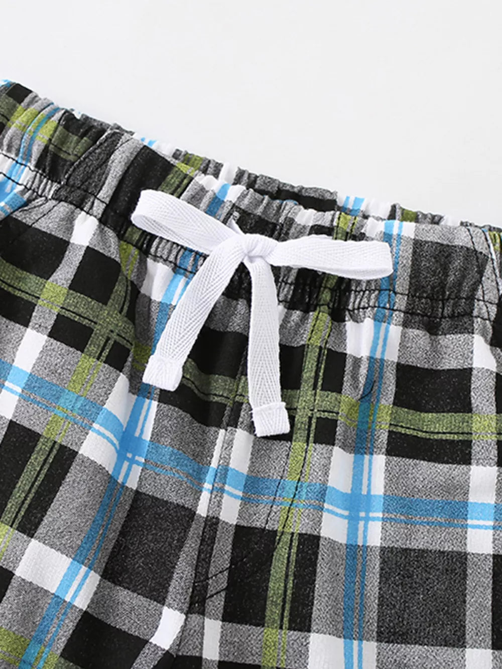 Baby shorts with plaid pattern and white drawstring detail.
