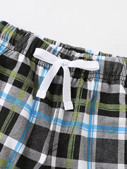Baby shorts with plaid pattern and white drawstring detail.