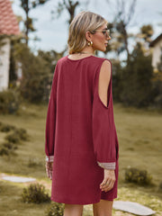 Wine cold shoulder mini dress with lace trim on sleeves.