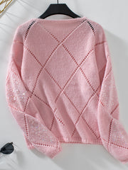 Dusty Pink diamond knit sweater with sequin detail on sleeves.