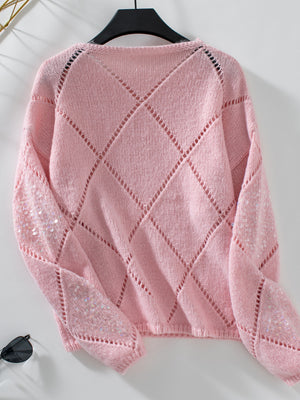 Dusty Pink diamond knit sweater with sequin detail on sleeves.