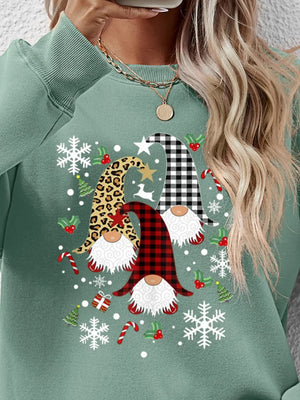 Sage green raglan sweatshirt with festive gnome graphic, snowflakes, and candy canes.
