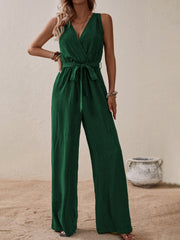 Dark green textured wrap-front wide-leg jumpsuit with tie waist