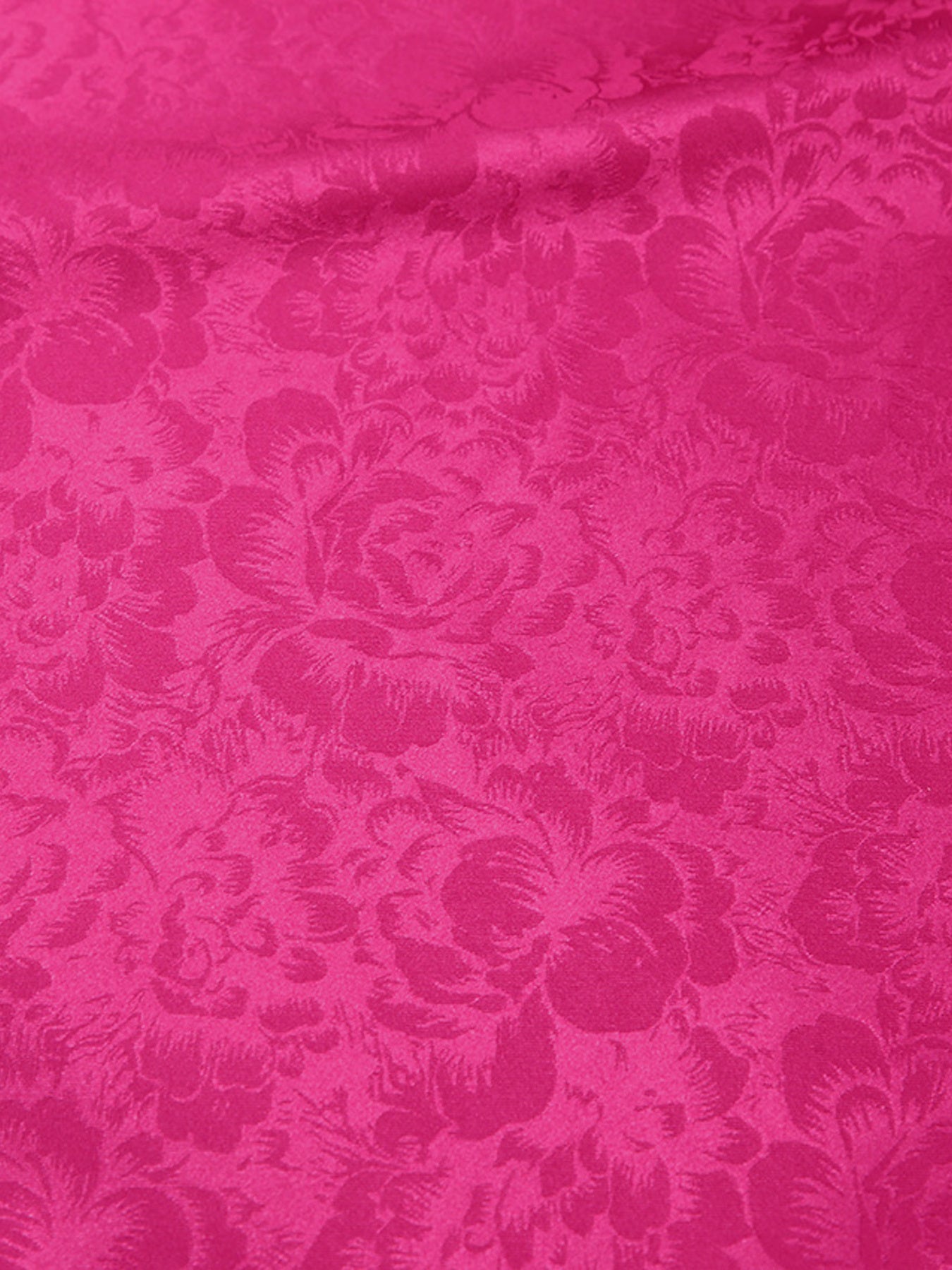 Vibrant cerise mini dress fabric with embossed floral pattern