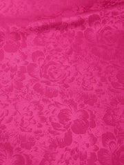 Vibrant cerise mini dress fabric with embossed floral pattern