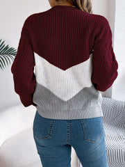 Chevron cable knit sweater in burgundy, white, and grey.